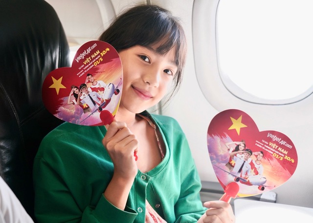 Những chuyến bay Vietjet rực rỡ cờ đỏ sao vàng - Ảnh 10.