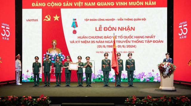 Viettel kỷ niệm 35 năm ngày truyền thống và đón nhận Huân chương Bảo vệ Tổ quốc hạng Nhất- Ảnh 1. Viettel kỷ niệm 35 năm ngày truyền thống và đón nhận Huân chương Bảo vệ Tổ quốc hạng Nhất- Ảnh 1.